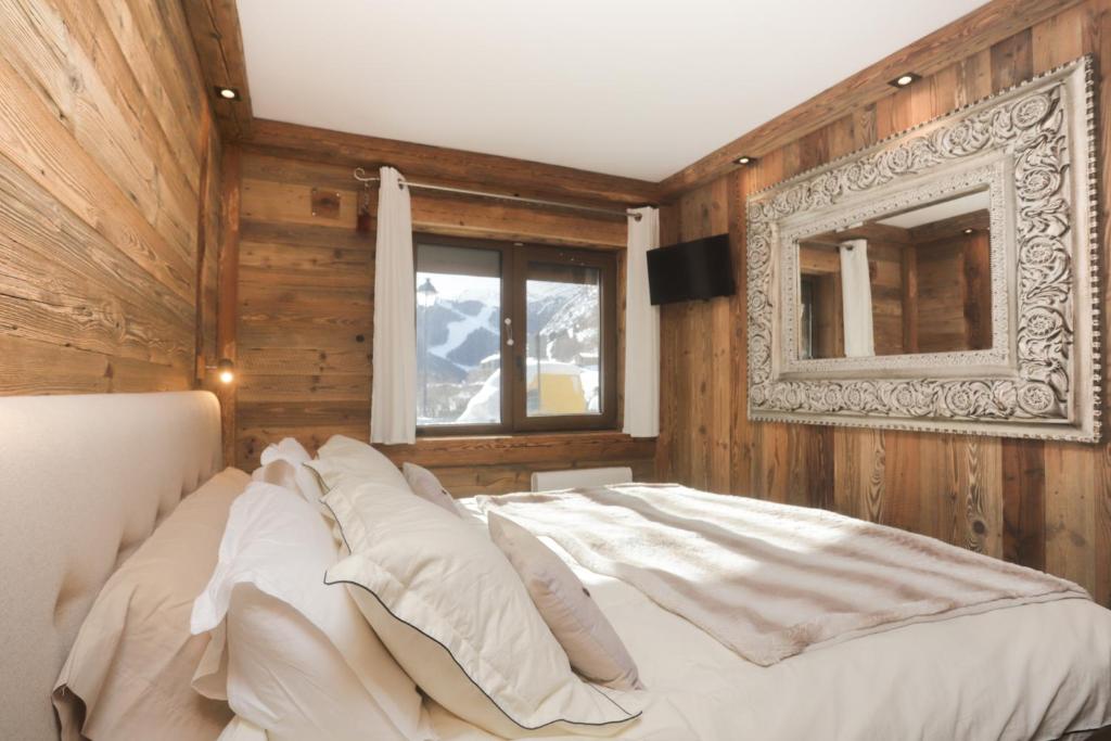 Ein Bett oder Betten in einem Zimmer der Unterkunft Appartement Chalet Vall d Incles Résidence Deu Sol