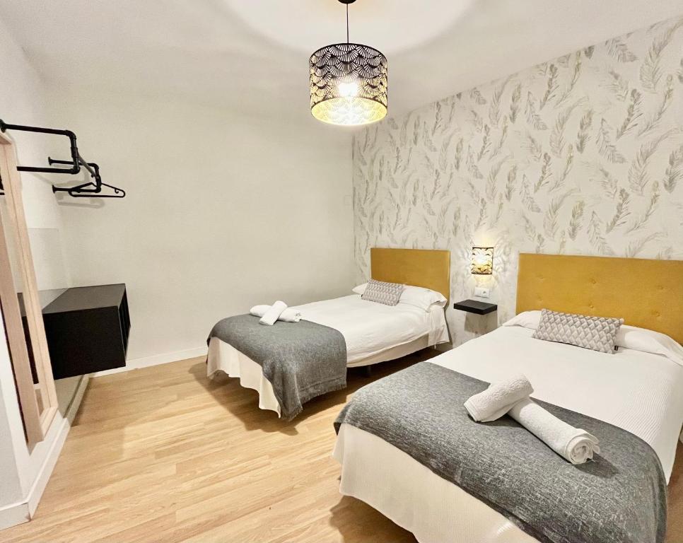 A bed or beds in a room at El balcón de la Mezquita