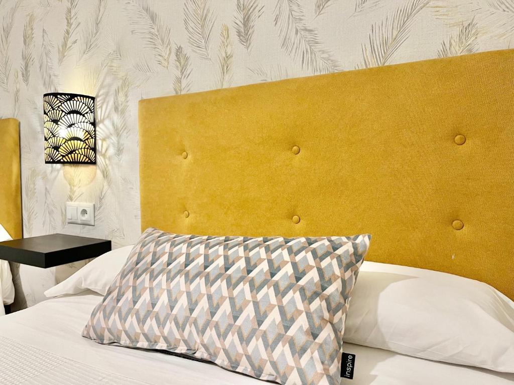 A bed or beds in a room at El balcón de la Mezquita