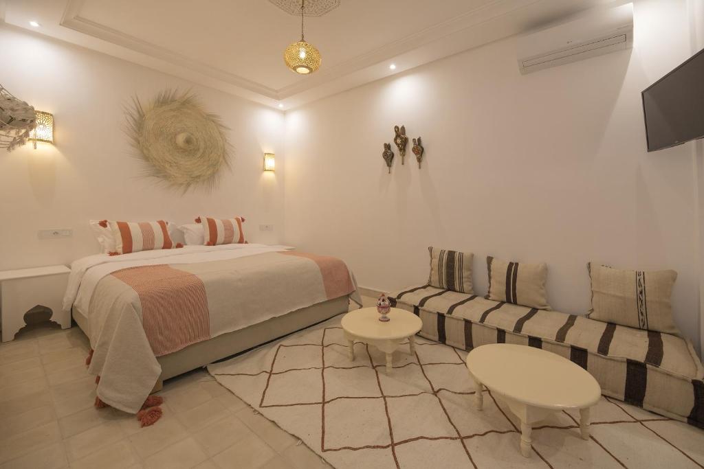 Postel nebo postele na pokoji v ubytování Riad l'Esprit des Patios & Spa