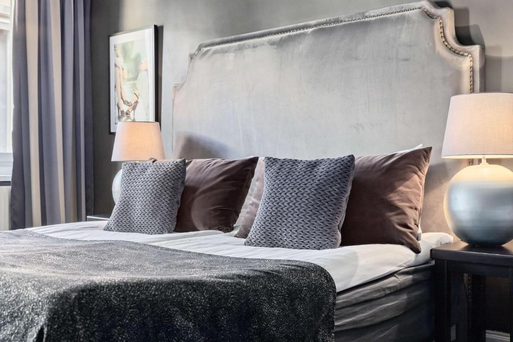 Postel nebo postele na pokoji v ubytování Centric Hotel
