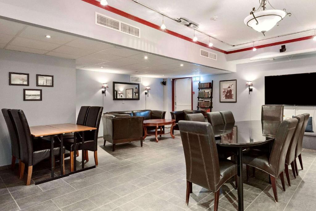 TV a/nebo společenská místnost v ubytování Sure Hotel by Best Western Ole Tobias