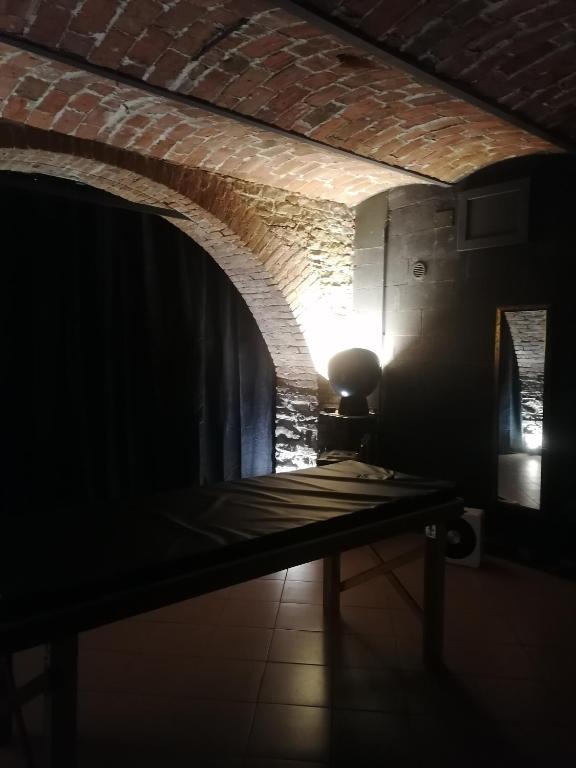 TV a/nebo společenská místnost v ubytování Villa Belvedere Langhe