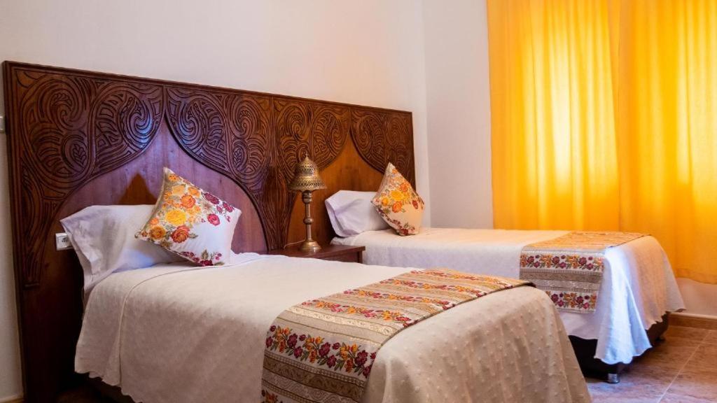 Postel nebo postele na pokoji v ubytování VILLA MATI Maison D'hôtes