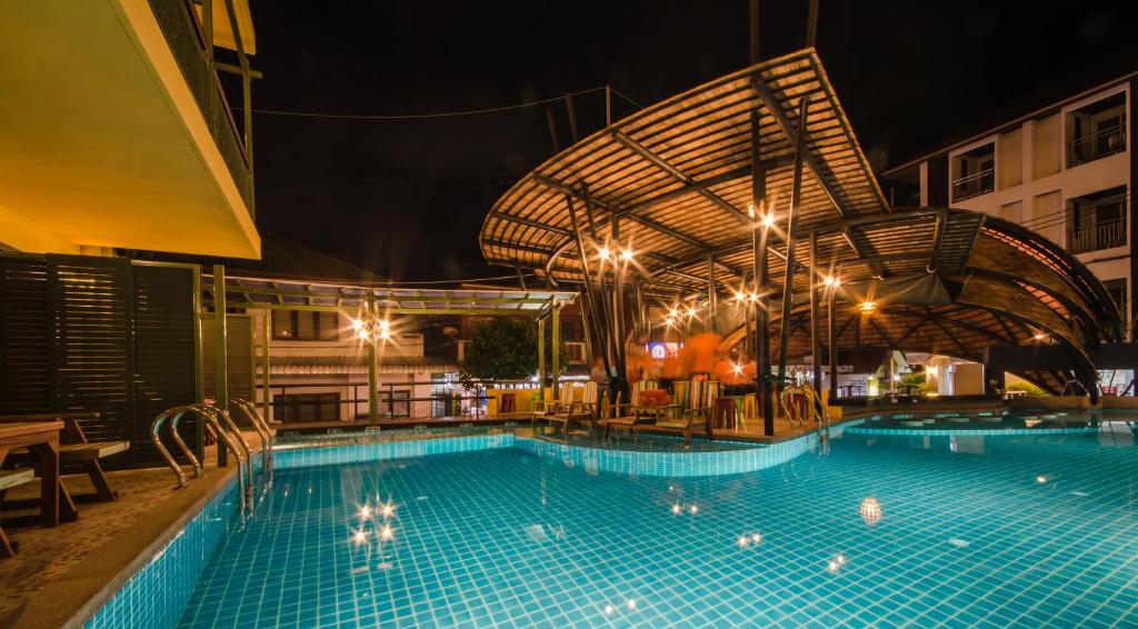 Bazén v ubytování Bhundhari Chaweng Beach Resort Koh Samui - SHA Plus nebo v jeho okolí