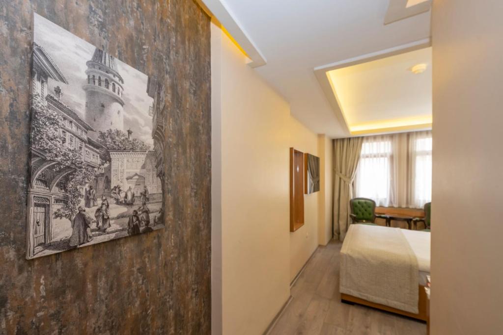 A bed or beds in a room at Hotel Devman