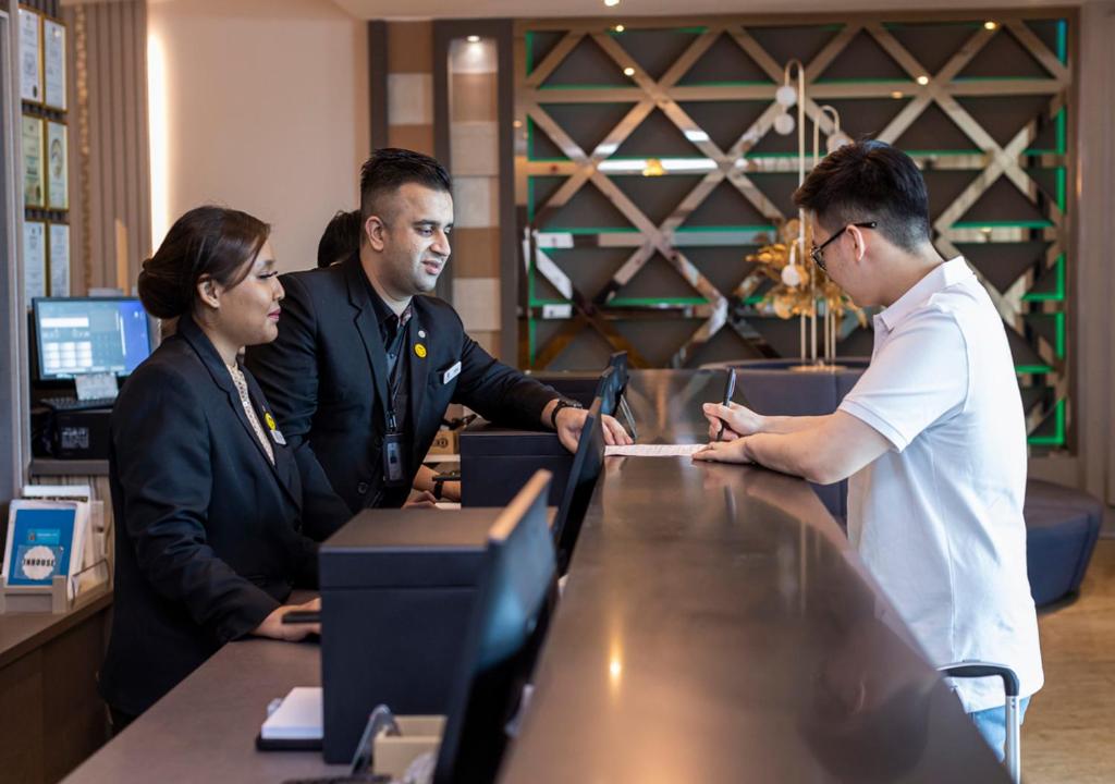 Hompton Hotel by the Beach photo