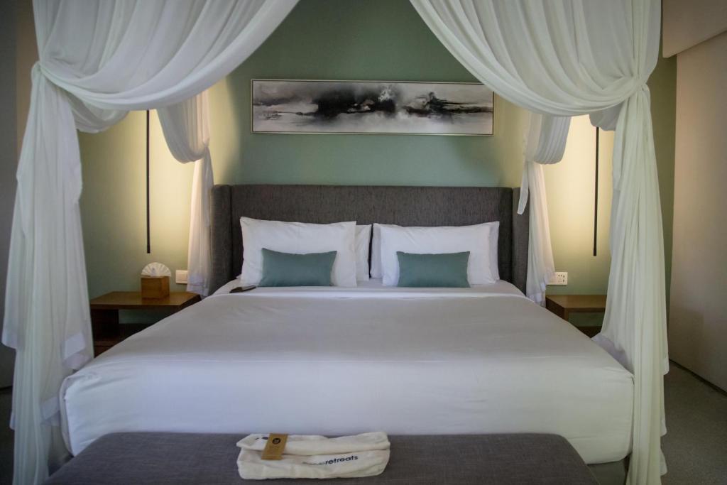 Кровать или кровати в номере The Amala Boutique Retreat