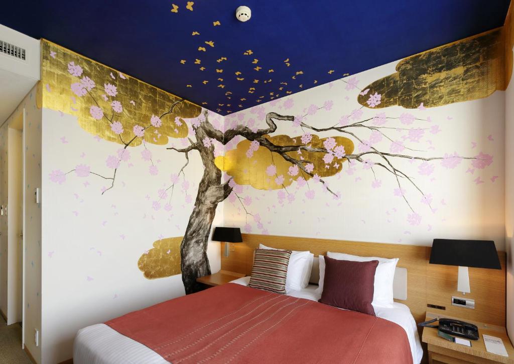 Postel nebo postele na pokoji v ubytování Park Hotel Tokyo