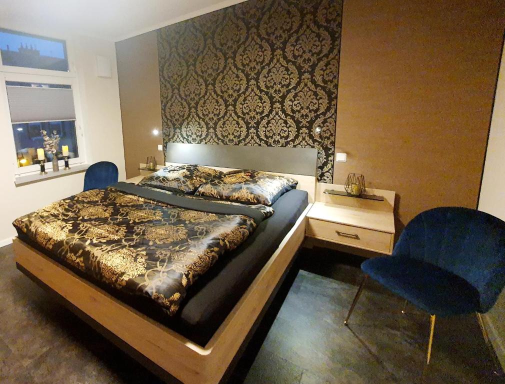 Postel nebo postele na pokoji v ubytování Ferienwohnung ODIN, FREYA & THOR