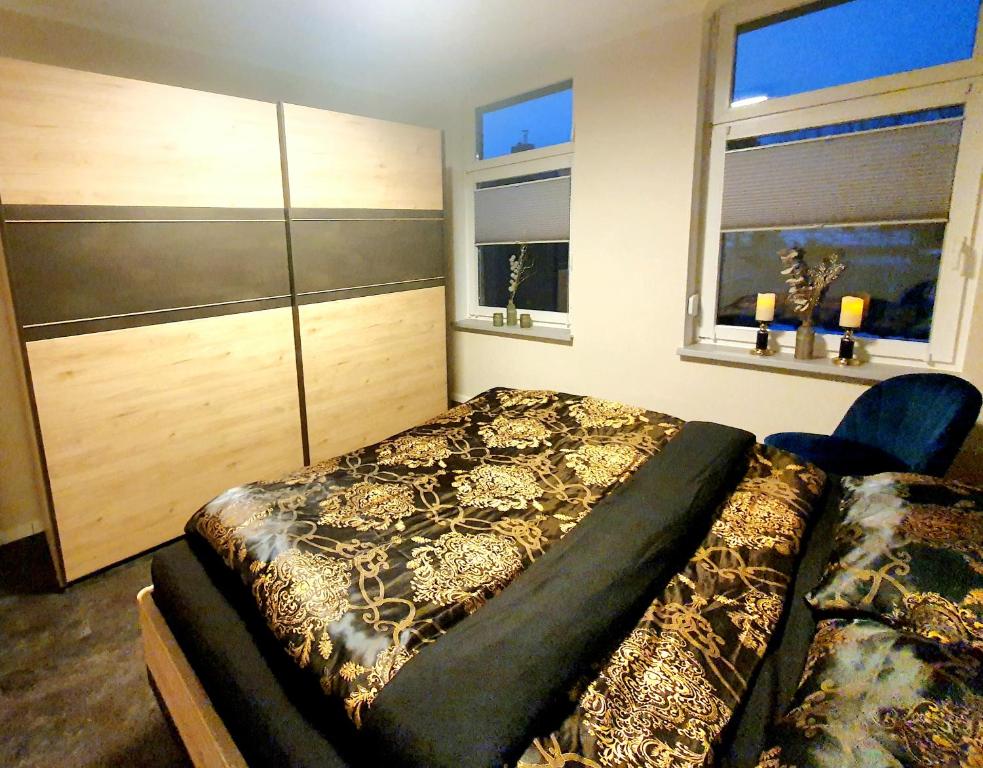 Postel nebo postele na pokoji v ubytování Ferienwohnung ODIN, FREYA & THOR
