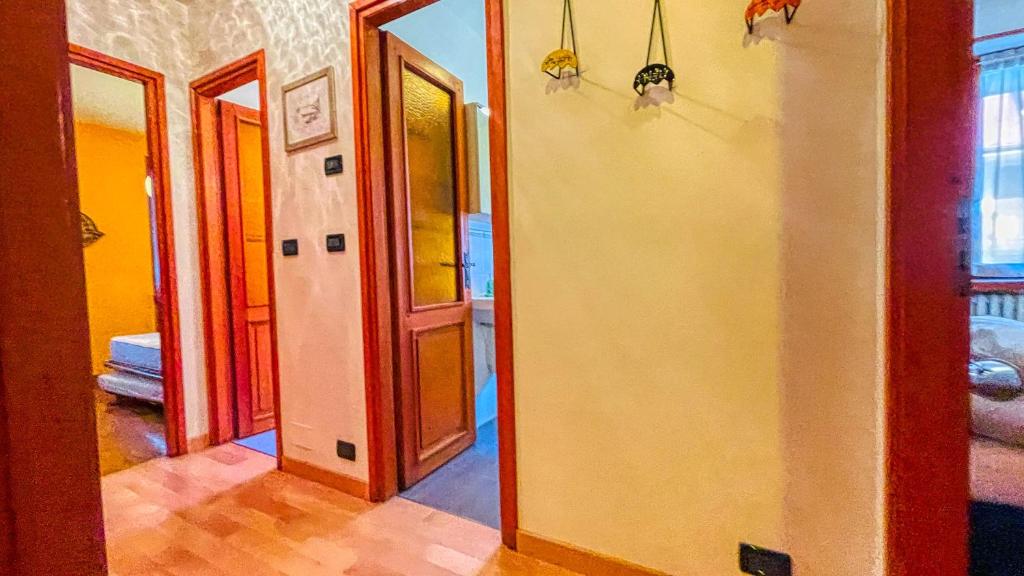 A bed or beds in a room at Appartamento Des Amis - Affitti Brevi Italia