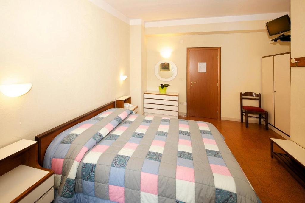 Postel nebo postele na pokoji v ubytování Albergo Ponte di Nava