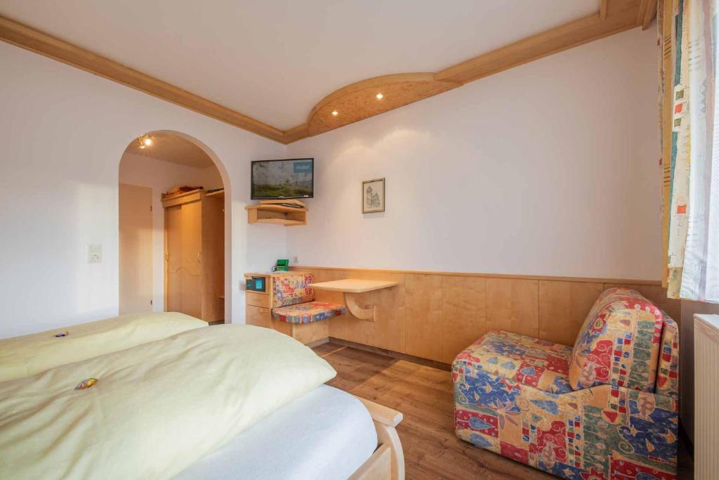 Postel nebo postele na pokoji v ubytování Haus Hubertus