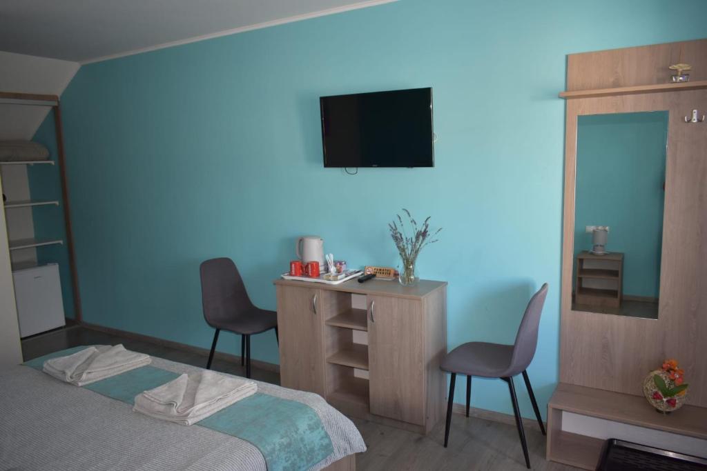 Postel nebo postele na pokoji v ubytování BBS Residence