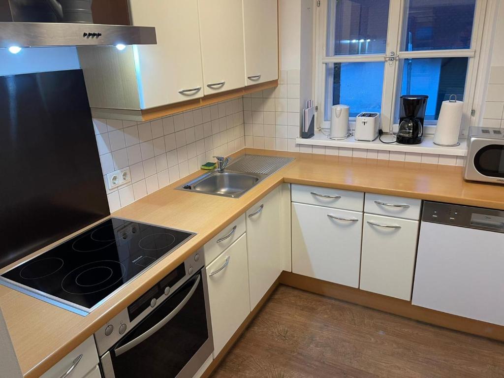 Kuchyňa alebo kuchynka v ubytovaní Haus Kampl - Appartement Grundlsee