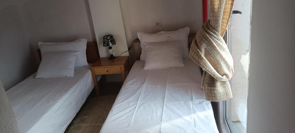 Postel nebo postele na pokoji v ubytování Rosa B&B