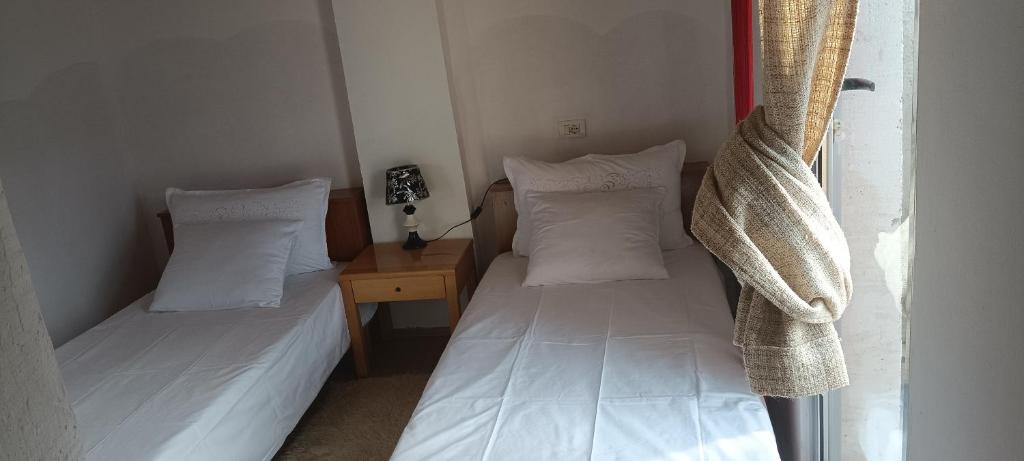 Postel nebo postele na pokoji v ubytování Rosa B&B