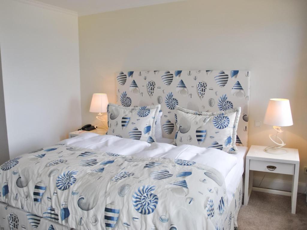 Postel nebo postele na pokoji v ubytování Strandhotel Miramar