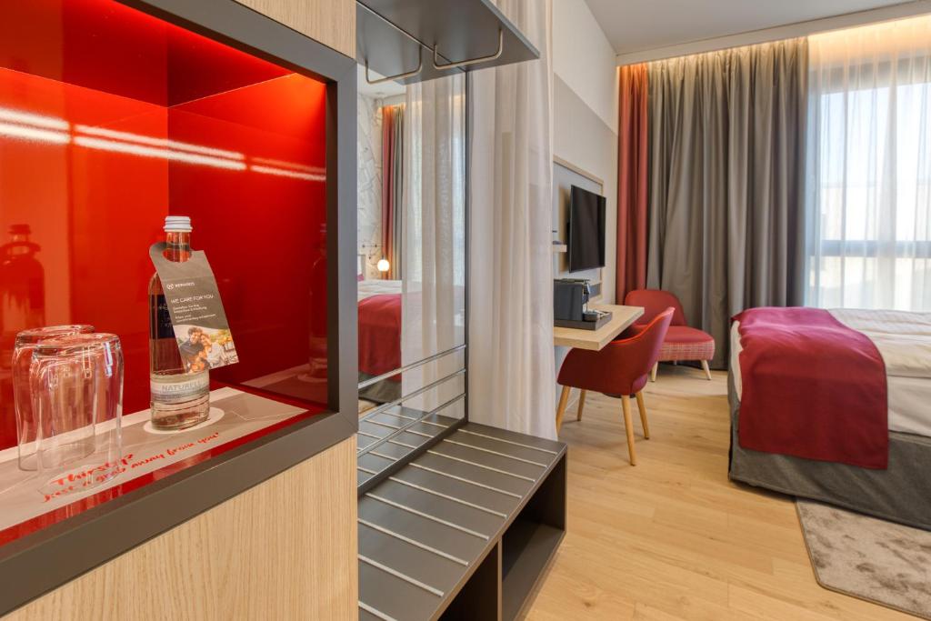 Postel nebo postele na pokoji v ubytování IntercityHotel Berlin Airport BER Terminal 1 & 2