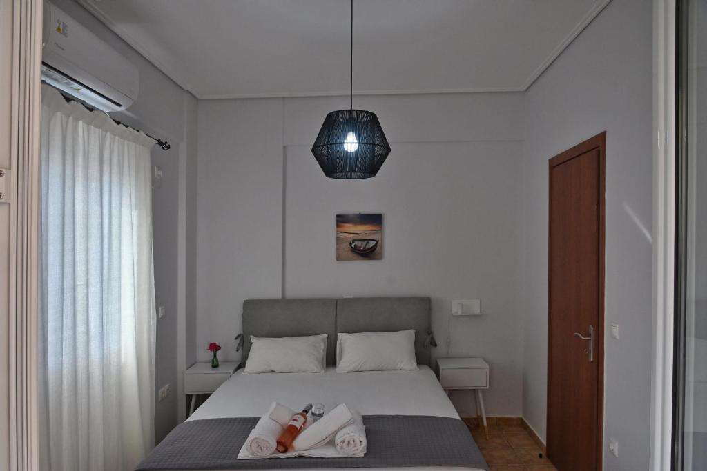 Posteľ alebo postele v izbe v ubytovaní Lagouvardos Apartments