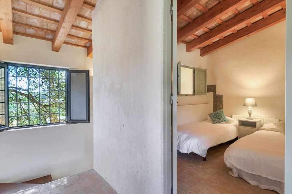 Postel nebo postele na pokoji v ubytování Mas del Blat CalongeCosta Brava en Mas Vilobí