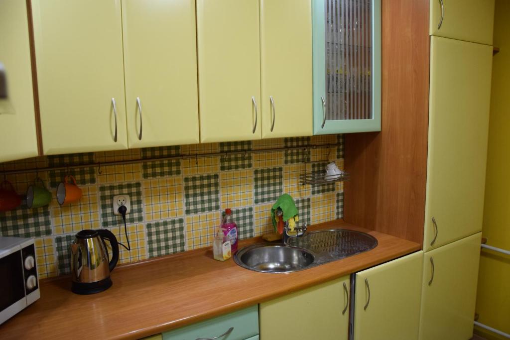 Kuchyňa alebo kuchynka v ubytovaní Apartament Julia 1-6 os II piętro z dwoma sypialniami