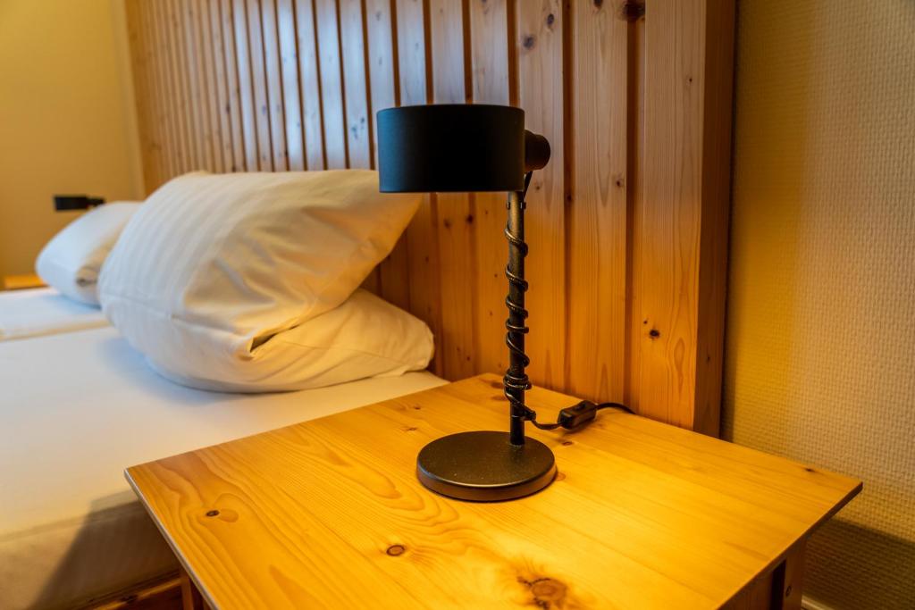 Postel nebo postele na pokoji v ubytování Fichtelberghaus