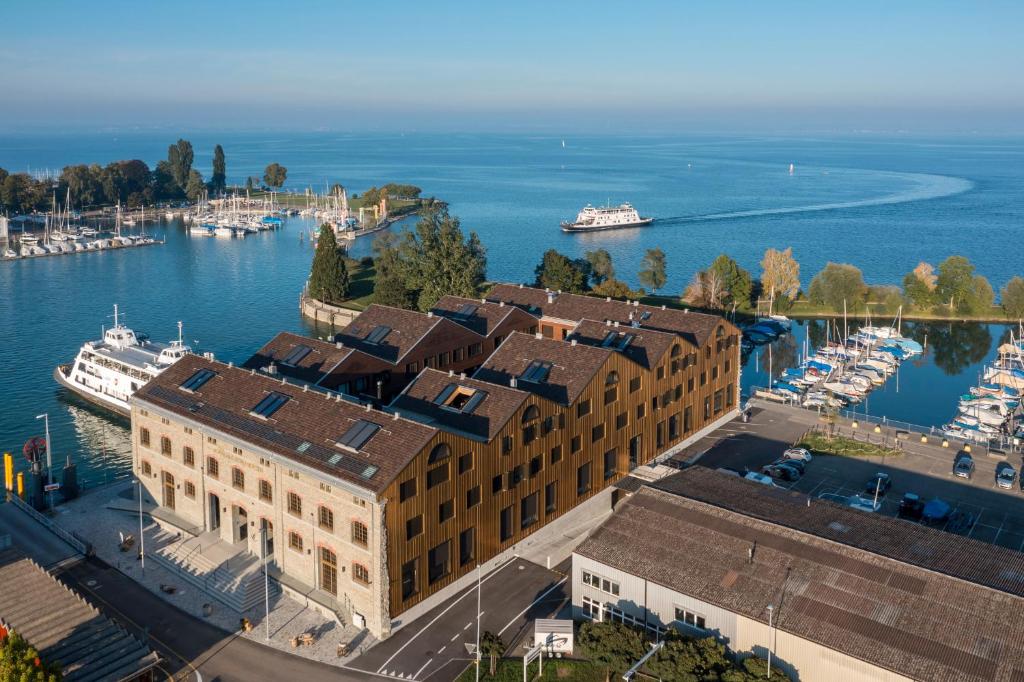 an aerial view of a harbor with boats in the water at Ferien im Kornhaus am Bodensee in Romanshorn