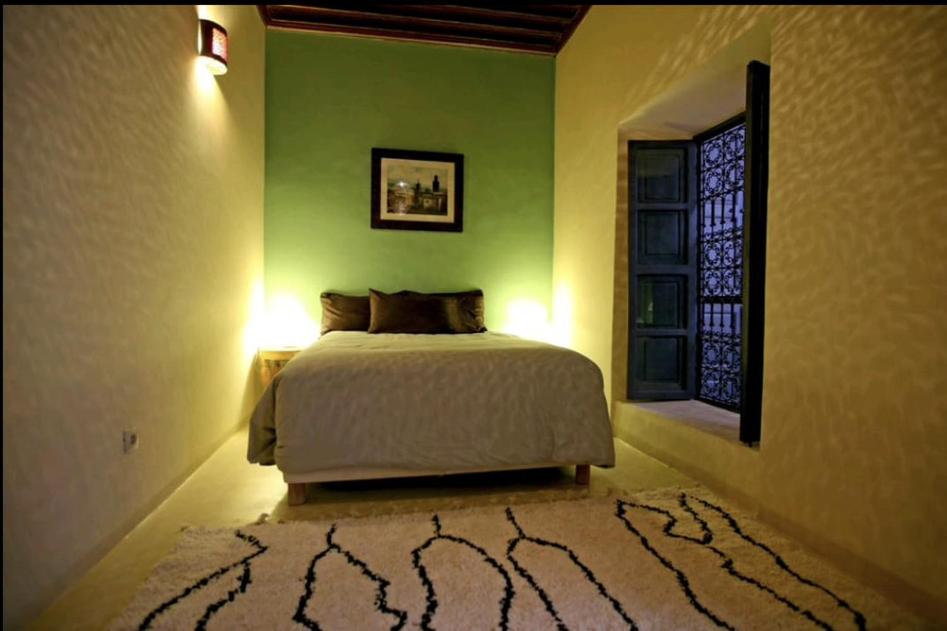 Postel nebo postele na pokoji v ubytování BKAN RIAD MARRAKECH