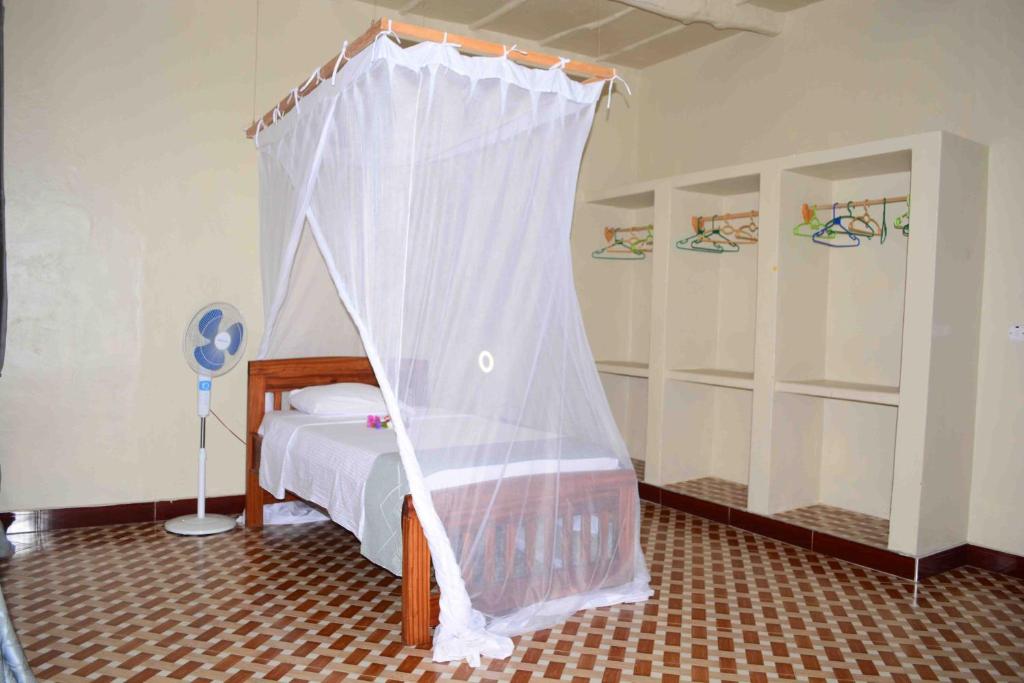Postel nebo postele na pokoji v ubytování Meremeta Lodge