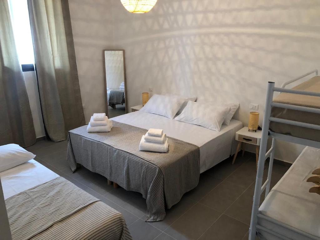 Posteľ alebo postele v izbe v ubytovaní B&B BELLAMI'