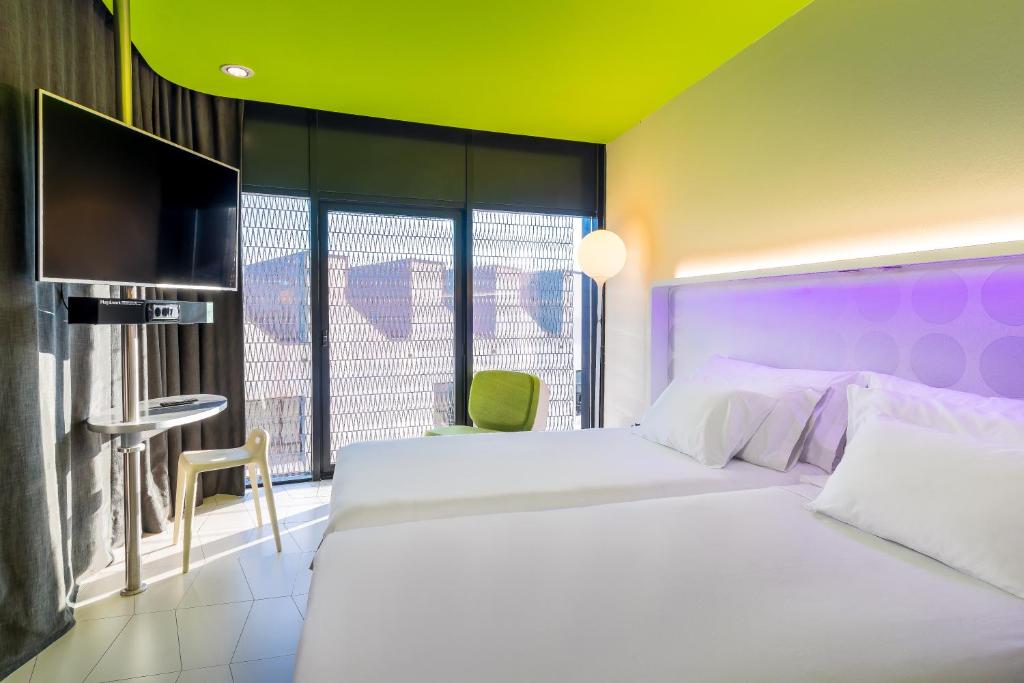 Posteľ alebo postele v izbe v ubytovaní Barceló Raval