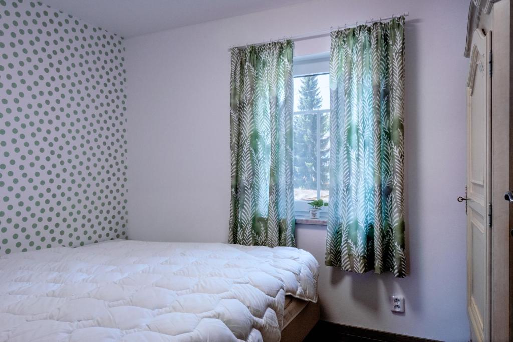 Letto o letti in una camera di Vila Tess