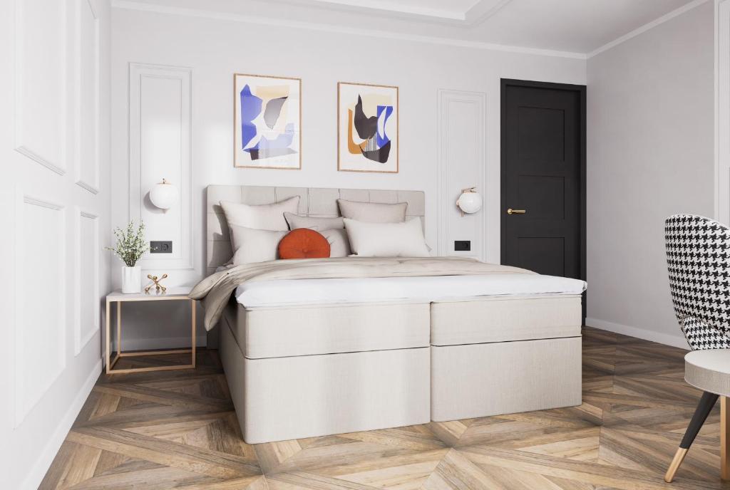 Ένα ή περισσότερα κρεβάτια σε δωμάτιο στο boutique Villa Dorma