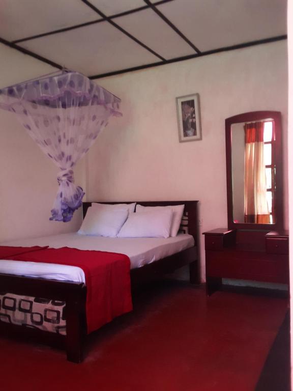 Ένα ή περισσότερα κρεβάτια σε δωμάτιο στο Lily adam's peak