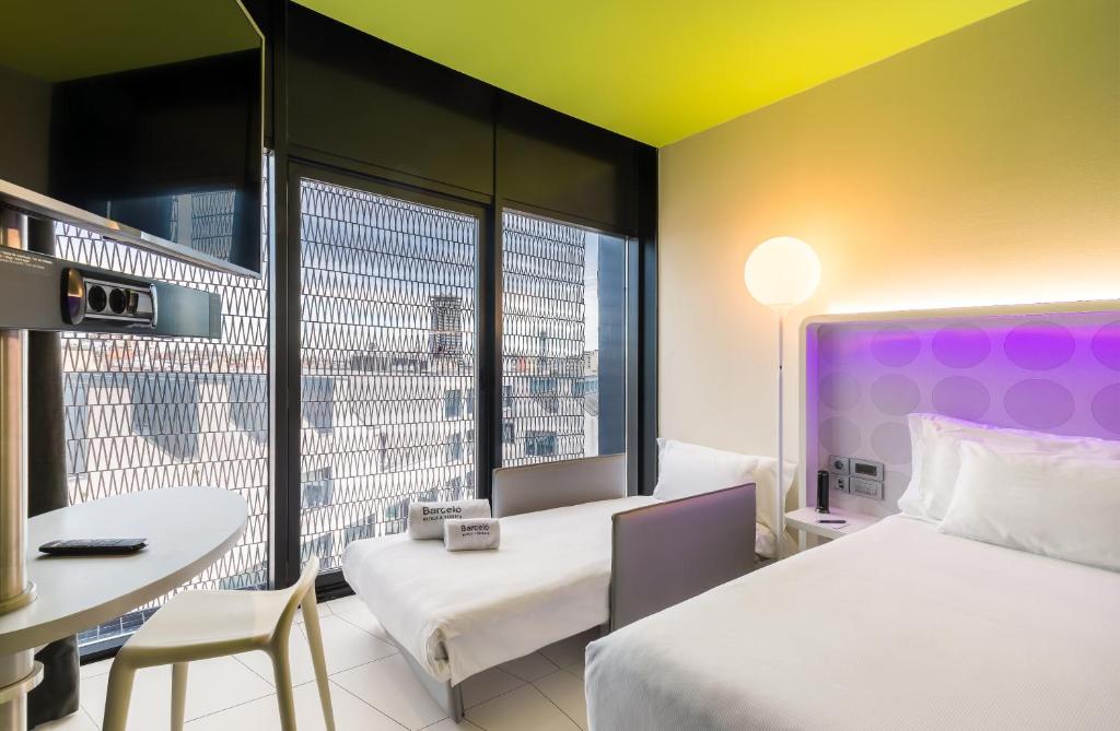 Posteľ alebo postele v izbe v ubytovaní Barceló Raval