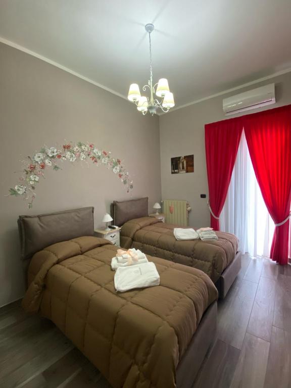 Postel nebo postele na pokoji v ubytování B&B Grazia