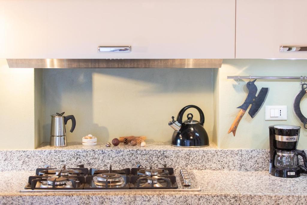 Kuchyňa alebo kuchynka v ubytovaní Casa della Luce Luxury