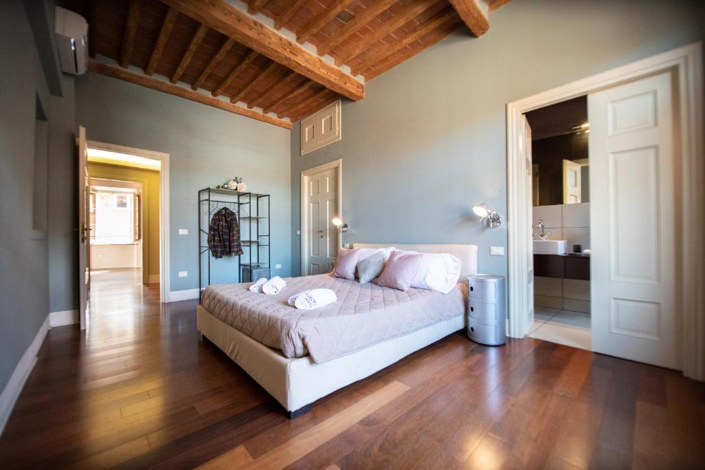 Posteľ alebo postele v izbe v ubytovaní Casa della Luce Luxury