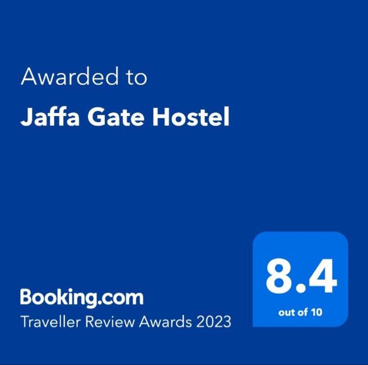 a screenshot of a cell phone with the text awarded to jatta gate hospital at Jaffa Gate Hostel in Jerusalem