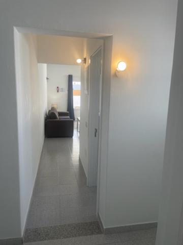 Postel nebo postele na pokoji v ubytování VILLAS NEW LANZASUITES PLUS