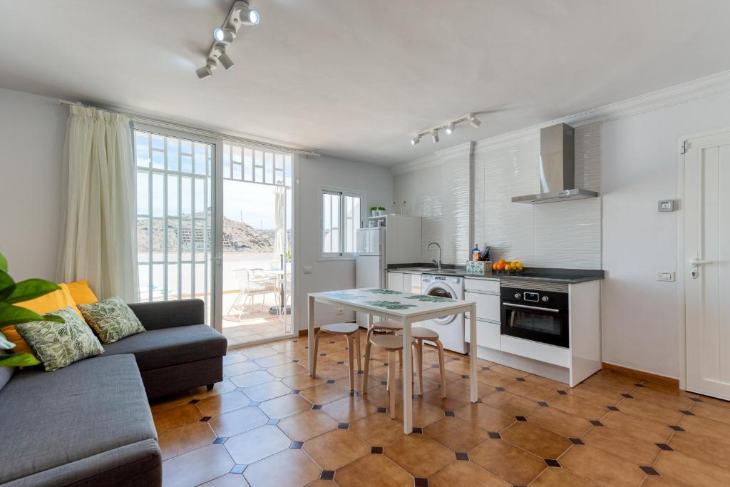 A kitchen or kitchenette at HomeForGuest A piece of oasis in the South of Gran Canaria