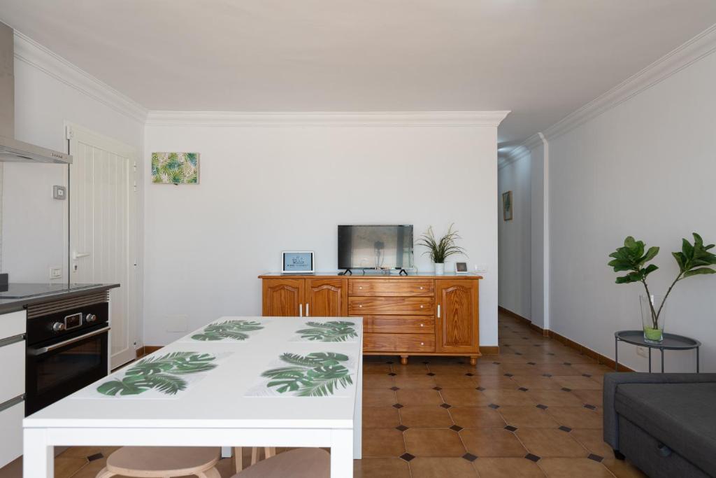 A kitchen or kitchenette at HomeForGuest A piece of oasis in the South of Gran Canaria