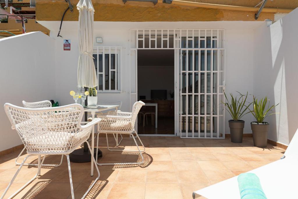 A balcony or terrace at HomeForGuest A piece of oasis in the South of Gran Canaria