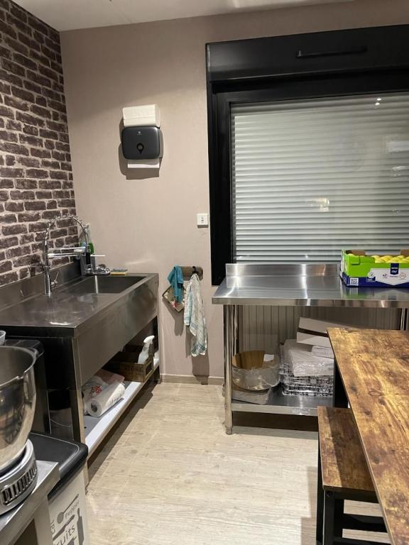 Kuchyň nebo kuchyňský kout v ubytování Chambre d'hôtes "Sur la route des Terrils"