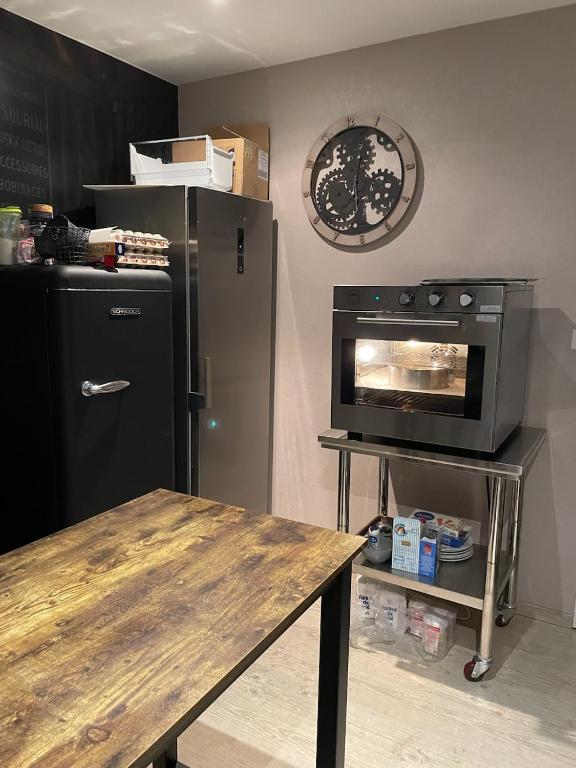 Kuchyň nebo kuchyňský kout v ubytování Chambre d'hôtes "Sur la route des Terrils"