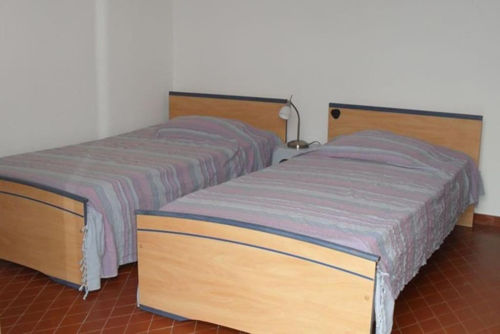 Llit o llits en una habitaci&oacute; de Appartement 8 pers. - Domaine de Padulone ALERIA