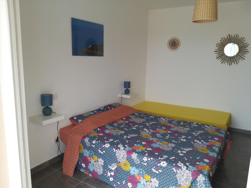 Posteľ alebo postele v izbe v ubytovaní Villa climatisée avec piscine