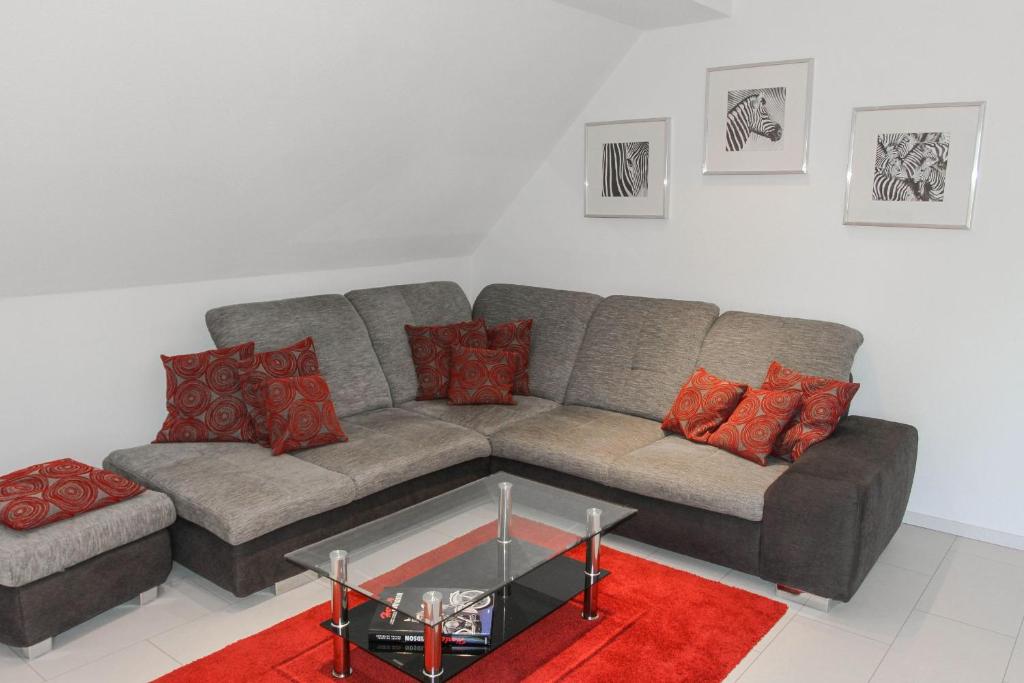 a living room with a couch and a coffee table at Kunibert, 120 qm in Stockach